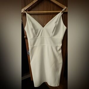 Express women’s white sheath dress in medium.